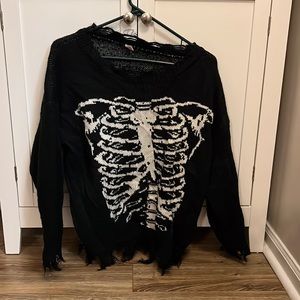 Distressed skeleton sweater